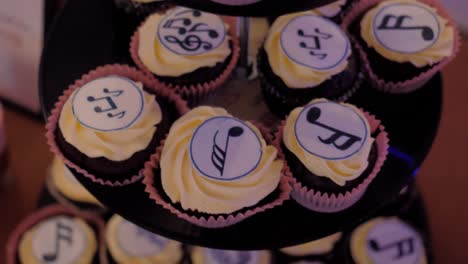 cakes with musical notes on top, revealing shot