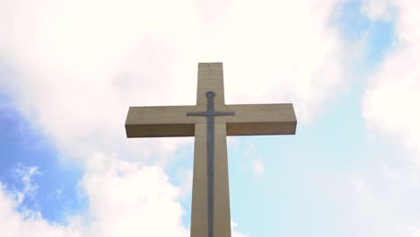 The-Mount-Macedon-Memorial-Cross-is-a-heritage-listed-war-memorial-at-Victoria-Australia-with-dynamic-clouds-moving-fast-at-the-background