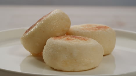 cheese cookies with condensed milk on the table with white tablecloth. high quality 4k footage