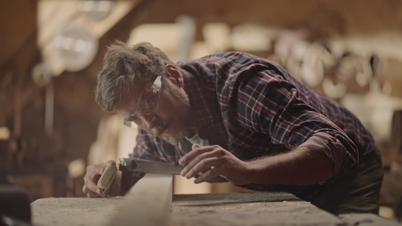 A carpenter working in a workshop