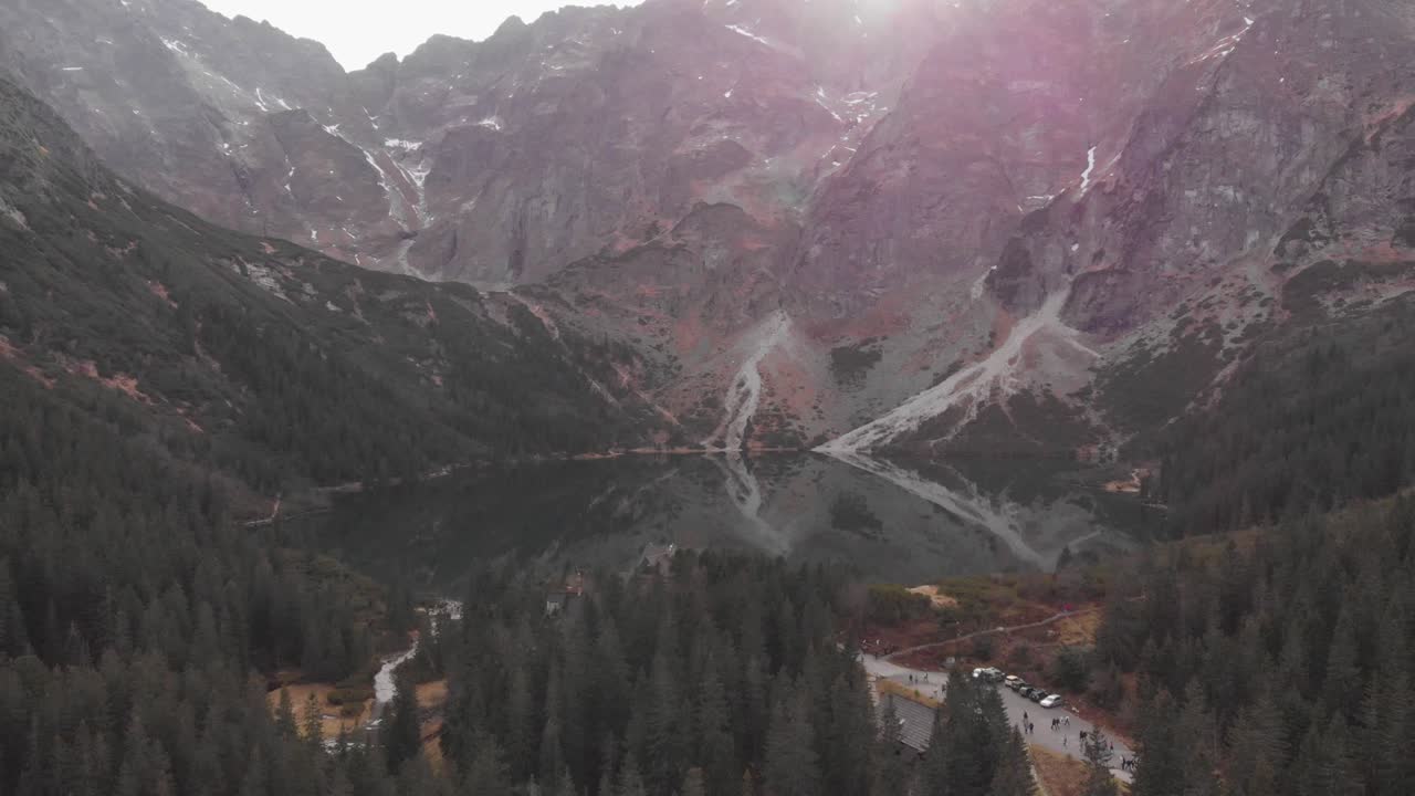 Amazing drone shoot entering the Morkie Oko lake in the National Park of Tatry, Poland