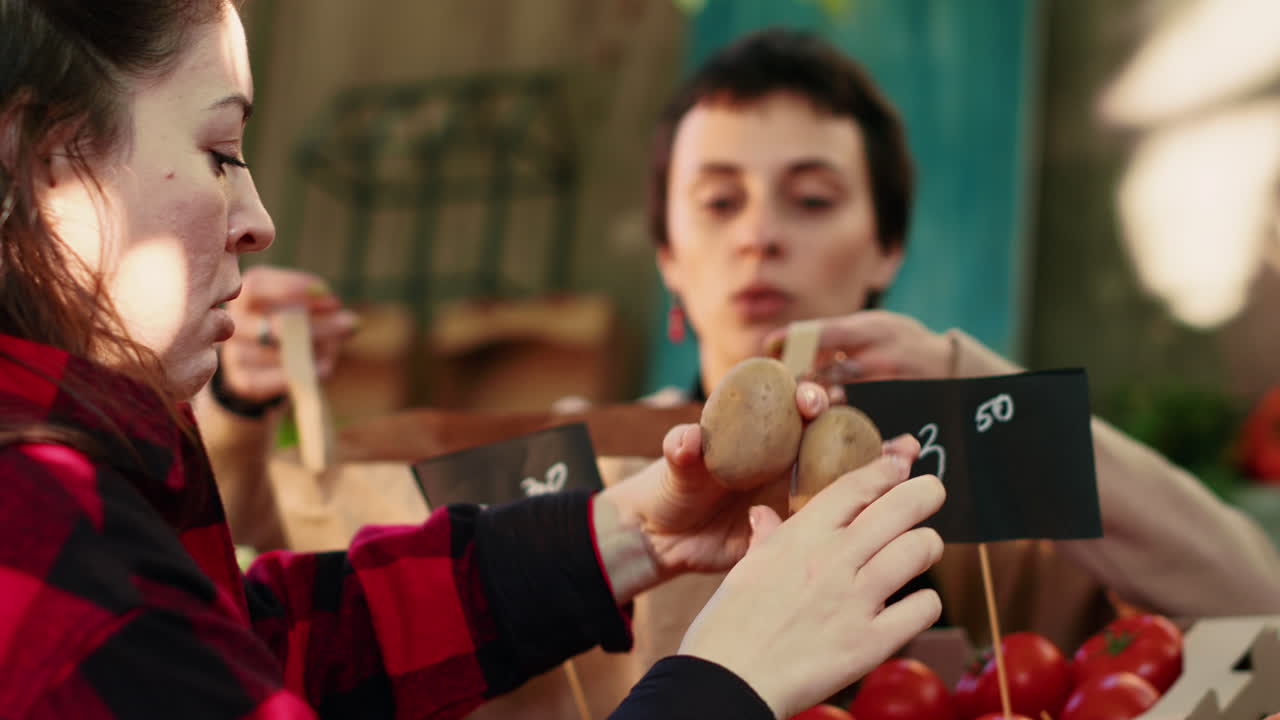 Customers buying vegetables at a market