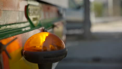 Close-Up-Of-Emergency-Warning-Light-On-Rear-End-Of-A-Truck