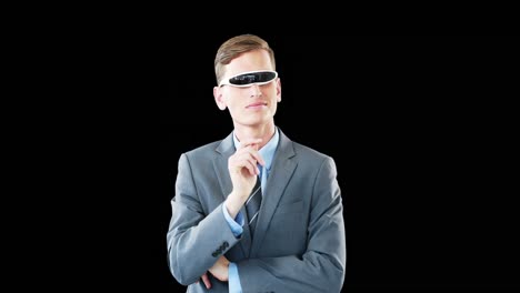 Businessman-in-virtual-video-glasses-using-digital-screen