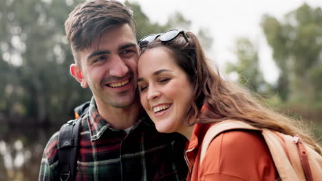 Hiking,-couple-and-hug-on-adventure-in-a-forest