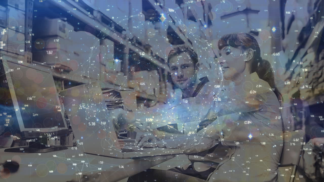 창고에서 노트북을 사용하는 남성과 여성 감독자를 중심으로 회전하는 연결 네트워크의 세계