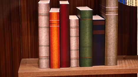 books on a wooden shelf