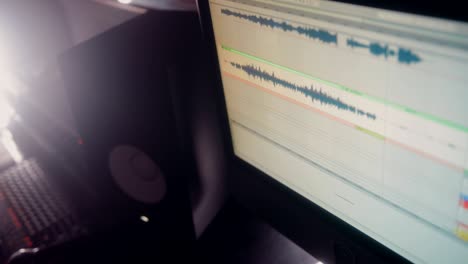 close-up of computer software music editor in music recording studio