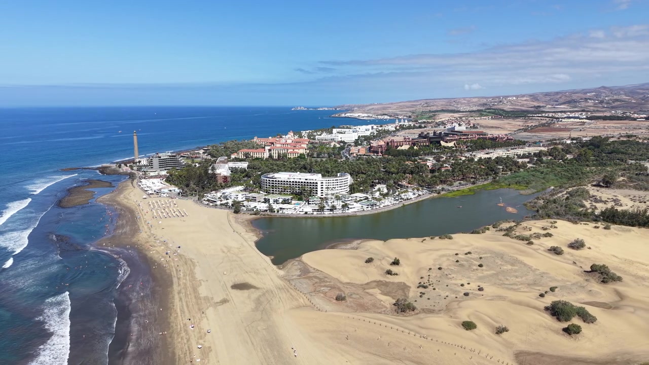 Aerial view of Maspalomas on Gran Canaria in the Canary Islands, Spain, showing the visible coastal landscape and surrounding area from above