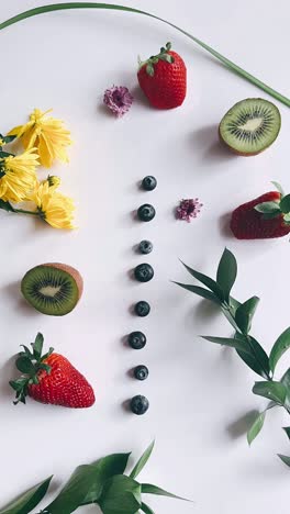 colorful fruit and flower arrangement