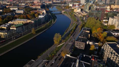 Tilt-up-aerial-revealing-Vilnius-historic-city-centre-next-to-Neris-river