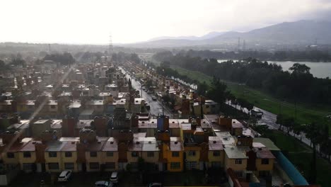 footage aerial above town with rain