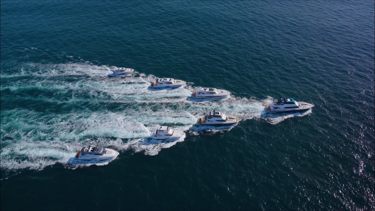 luxurious fancy yachts Convoy cruising in open waters in arrow shape