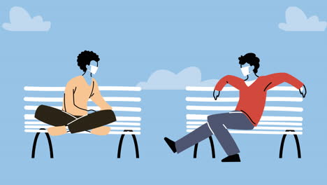 young men wearing medical masks for covid19 prevention seated in park chairs