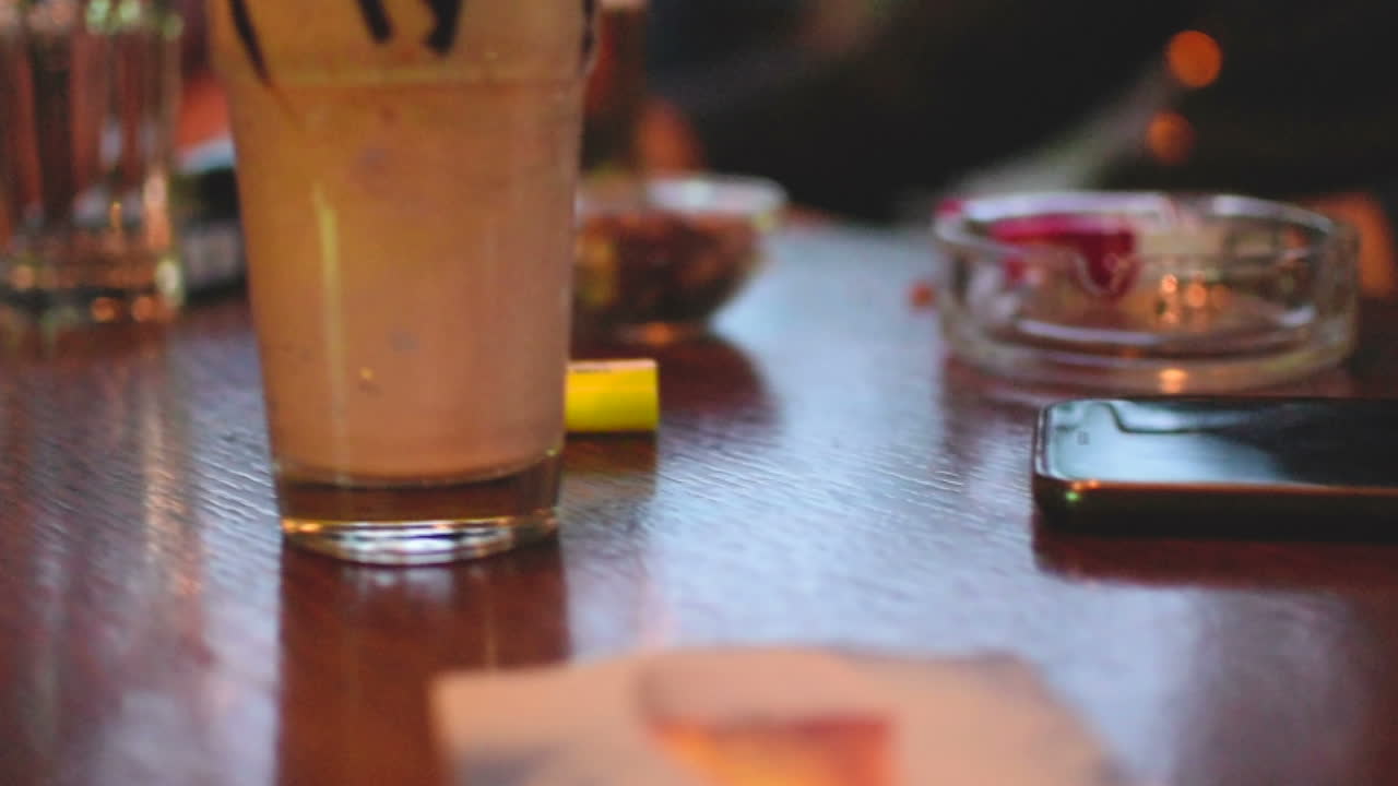 Serving a beer in a bar