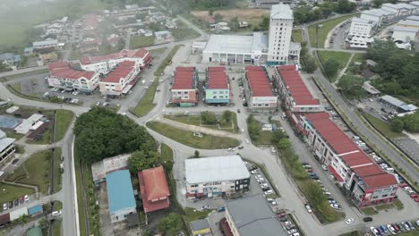 foggy morning beautiful drone view of sri aman town at batang lupar river, during regatta and pesta benak,sarawak, borneo.