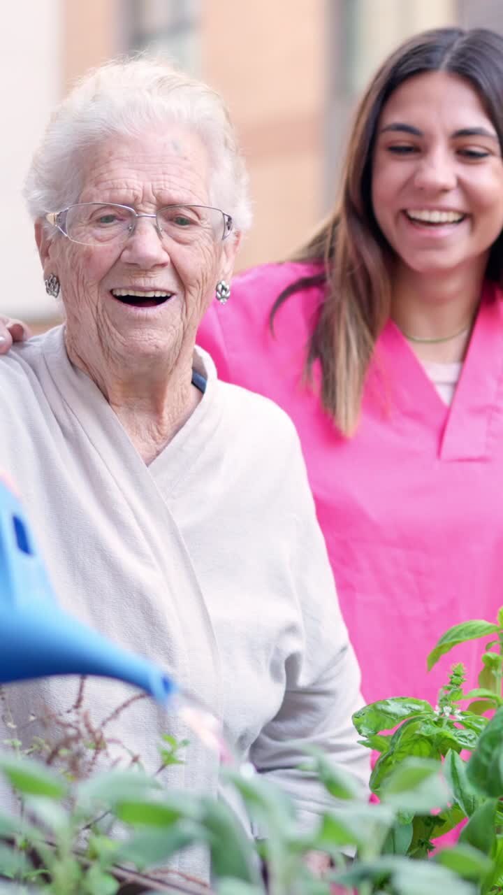 Elderly woman gardening with caregiver