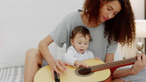 guitar, woman and baby playing