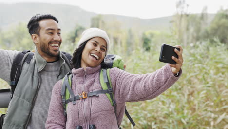 couple, hiking and a peace sign in nature