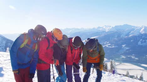 skiers with ski interacting on snowy landscape