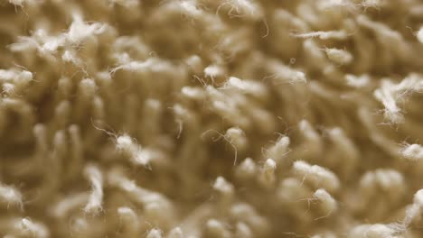 threads of beige color towel macro.