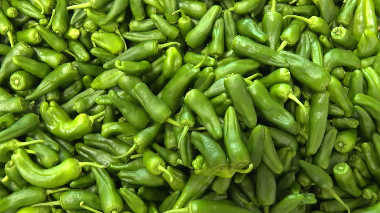 Fresh Green Peppers in a Wooden Crate
