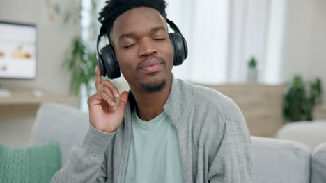 black man, headphones and dance to music