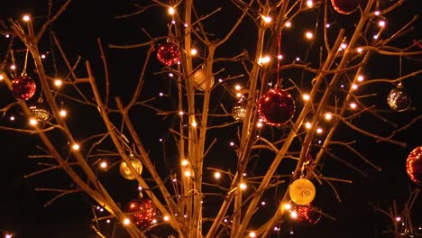 chrismas decoration blowing in the wind in december outside and irish house in dublin