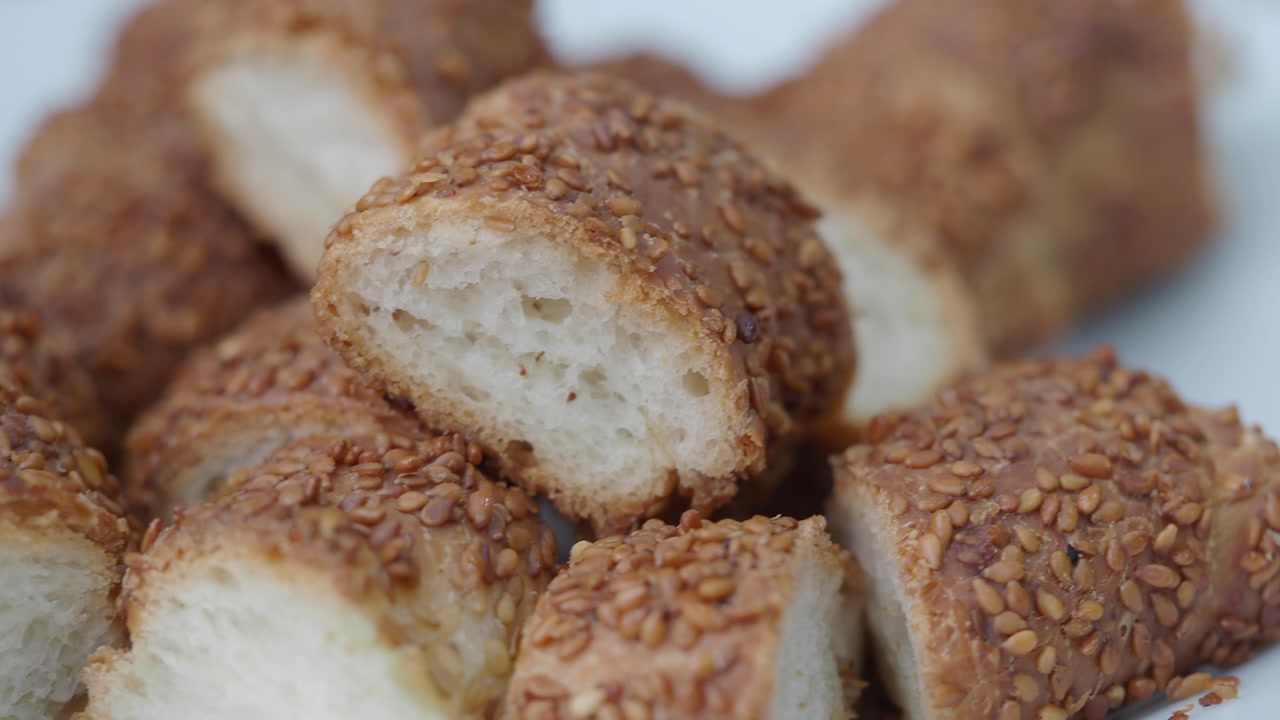Close-up of Sliced Turkish Simit with Sesame Seeds