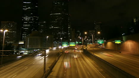 a beautiful shot of time lapsed freeway traffic in a downtown area 1
