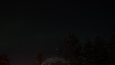 Timelapse-of-man-shooting-northern-lights