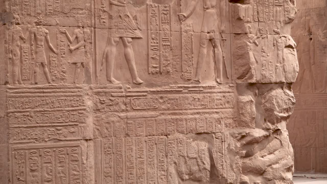 Detail of ancient hieroglyphs on a wall in an ancient temple in Kom Ombo, Egypt.