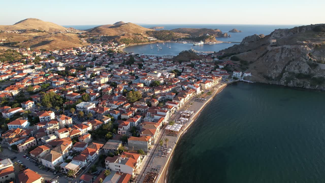 Aerial View of Myrina Limnos Island, Romeikos Gialos, City Center and Castle View, Dolly Shot at Dawn