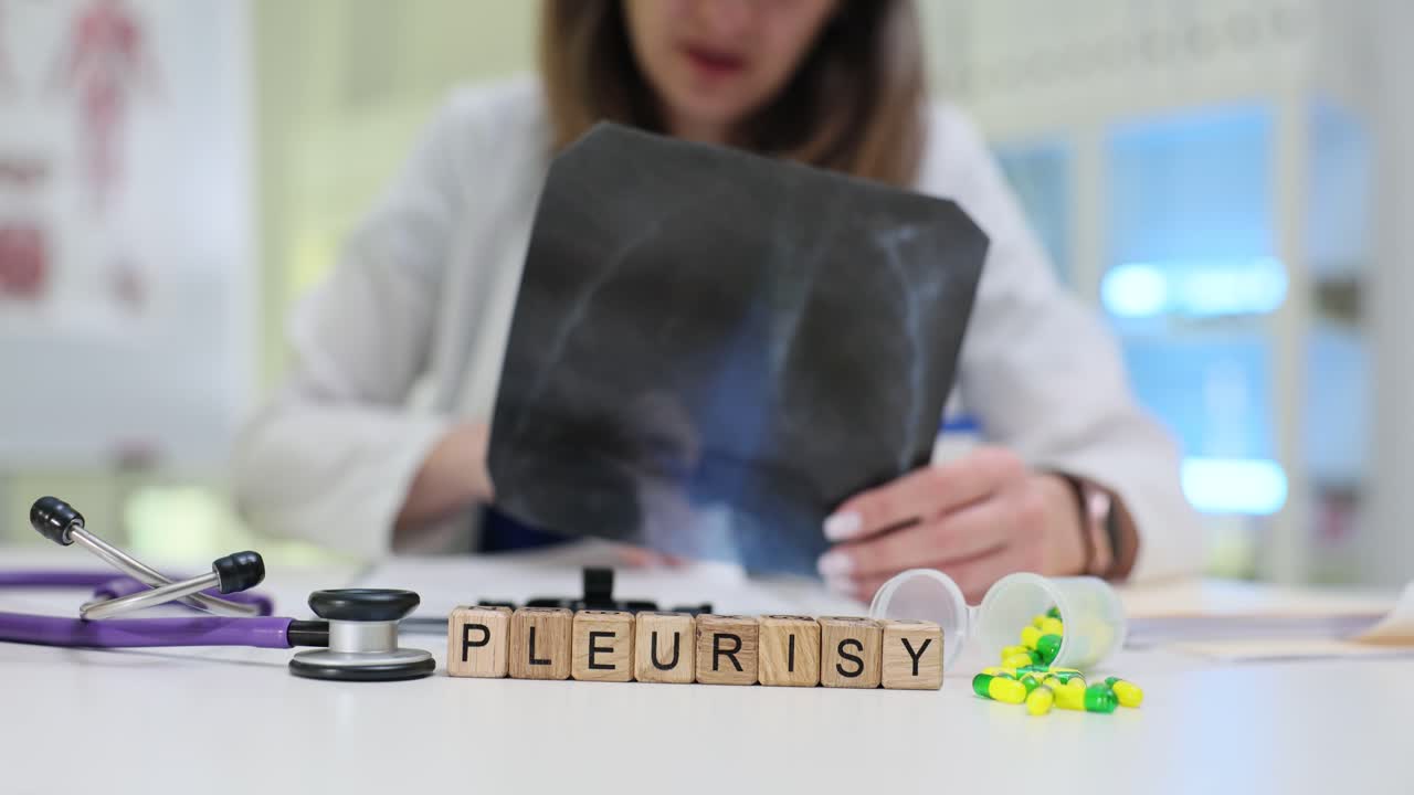 Doctor examining x-ray for pleurisy