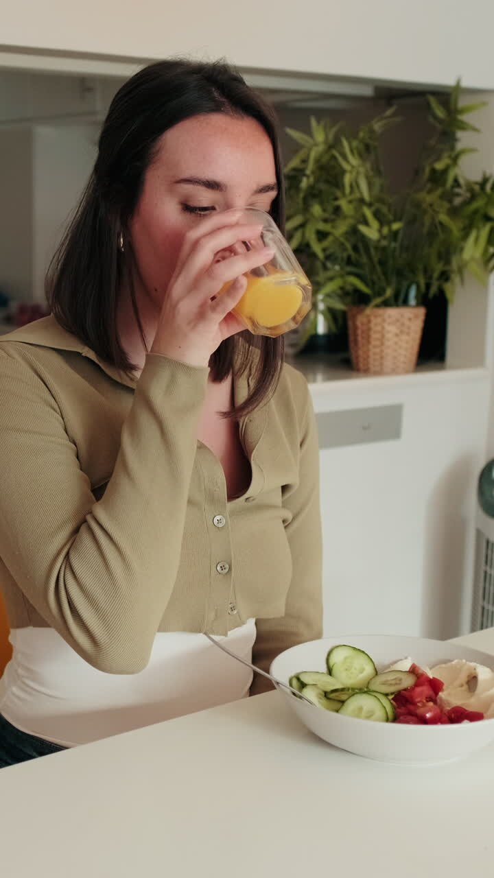 Woman Eating Healthy Breakfast at Home