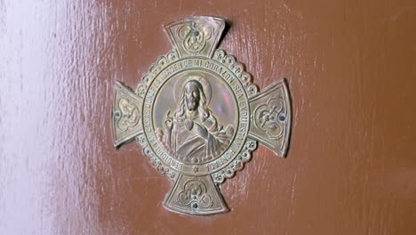 Image of a Jesus Christ decorative door figure is seen at a home&#039;s door to welcome guests