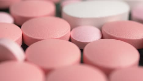 close-up of assorted pink and white pills