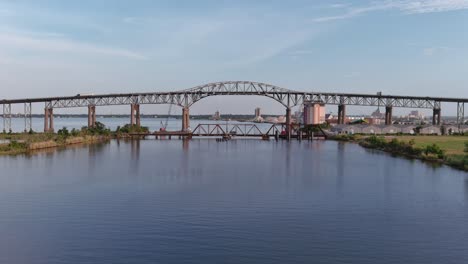 Aerial-of-cars-traveling-over-the-Calcasieu-River-Bridge-in-Lake-Charles,-Louisiana