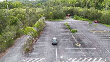 aerial view of electric car in carpark