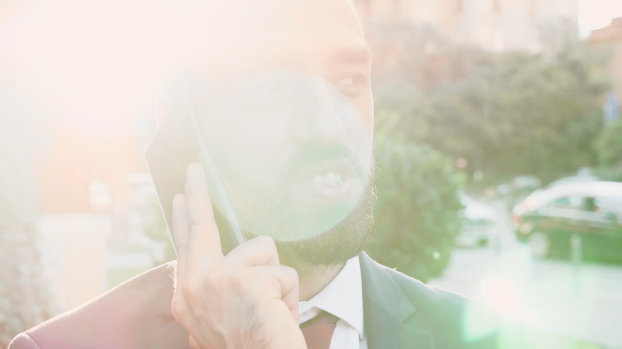 Man talking on the phone in a suit