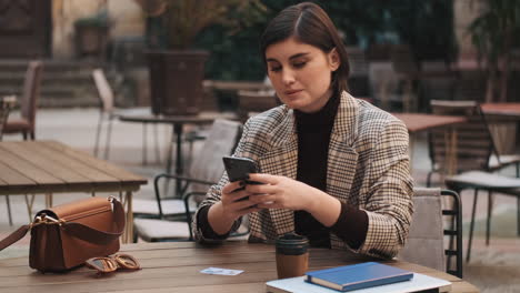 businesswoman in a coffee break outdoor.