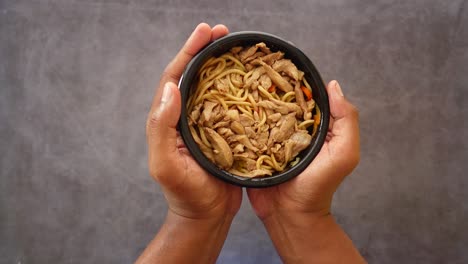 closeup of a bowl of chicken and noodles