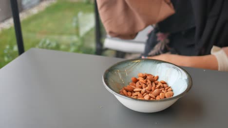 woman eating almonds