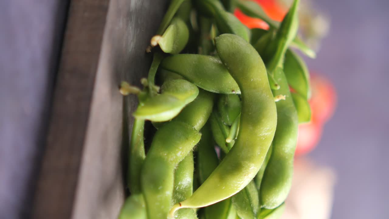 Fresh Green Edamame Pods on a Wooden Surface