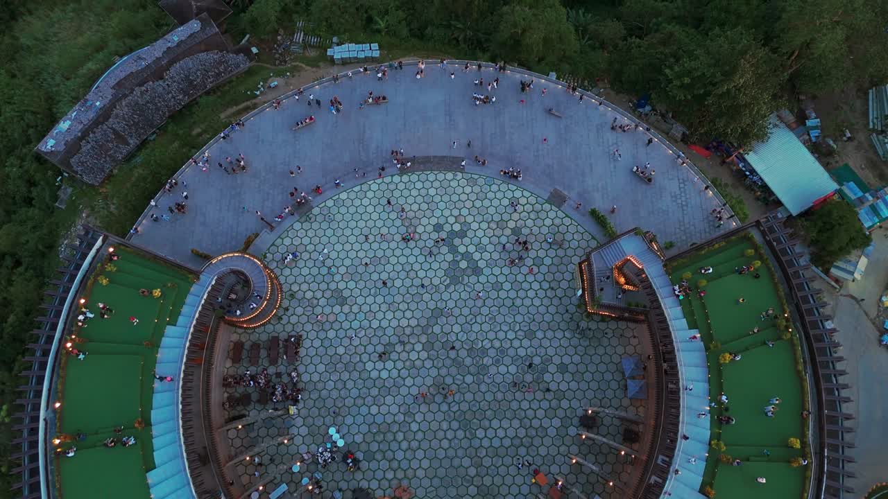 Unique top-down drone shot of Cebu’s Tops Lookout showing circular architecture, symmetry, and tourists enjoying the landmark. Perfect for travel, tourism, and architecture projects