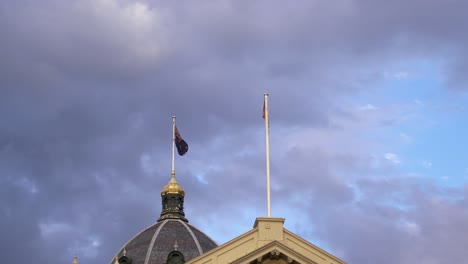 the australian and the australian aboriginal flags flying in melbourne