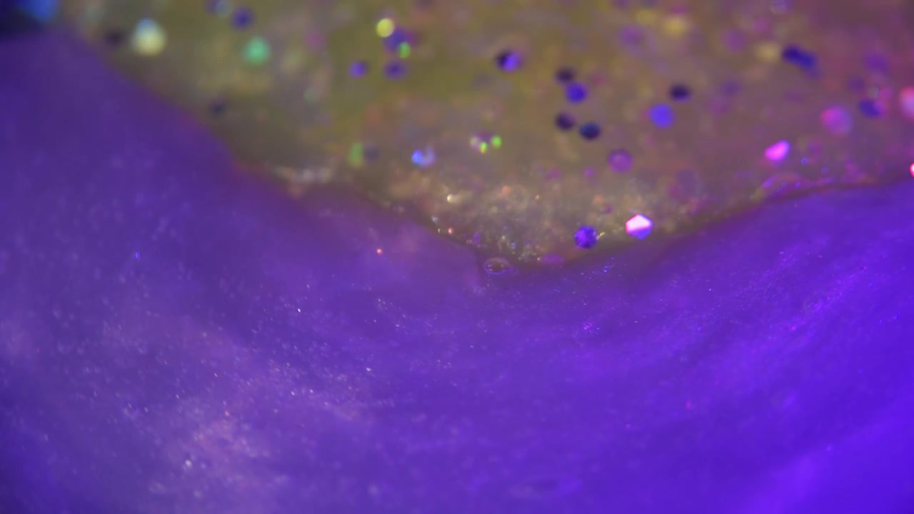 Abstrakte hvirvlende farver og glitterteksturer