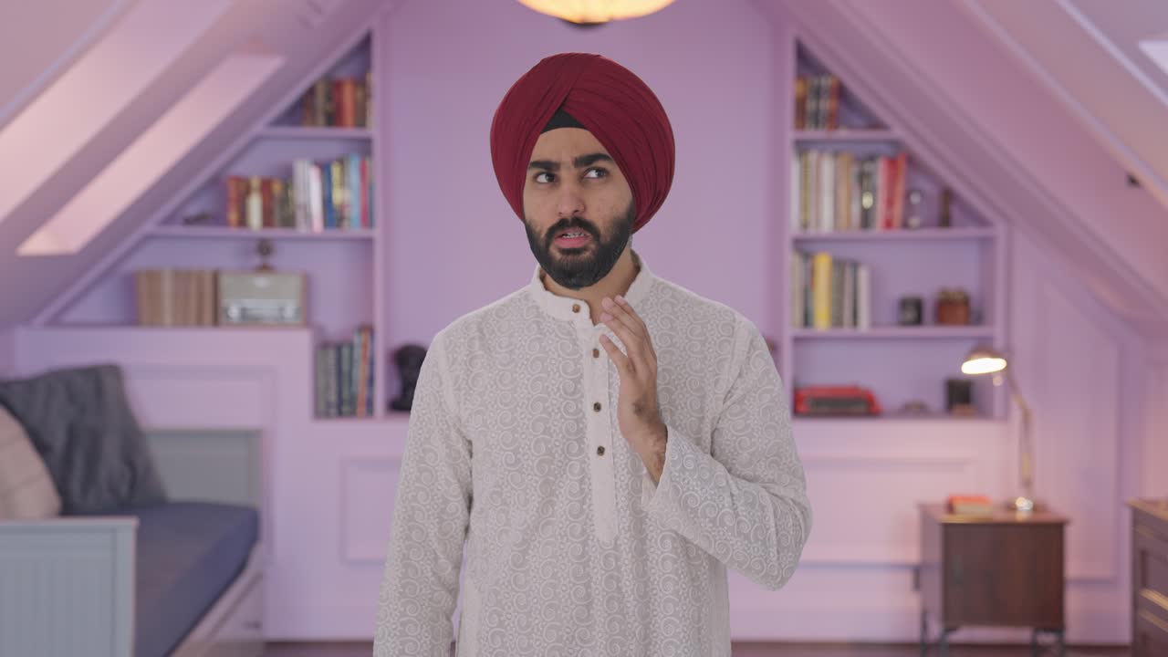 Uomo indiano Sikh malato che soffre di mal di denti