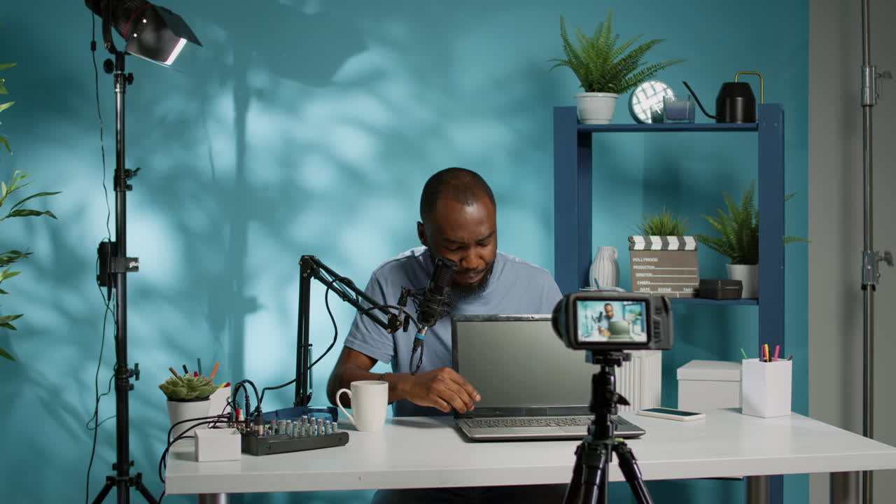 Blogger doing product review for laptop and keyboard