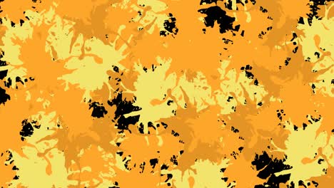 animación de salpicaduras amarillas y naranjas de pintura sobre fondo negro